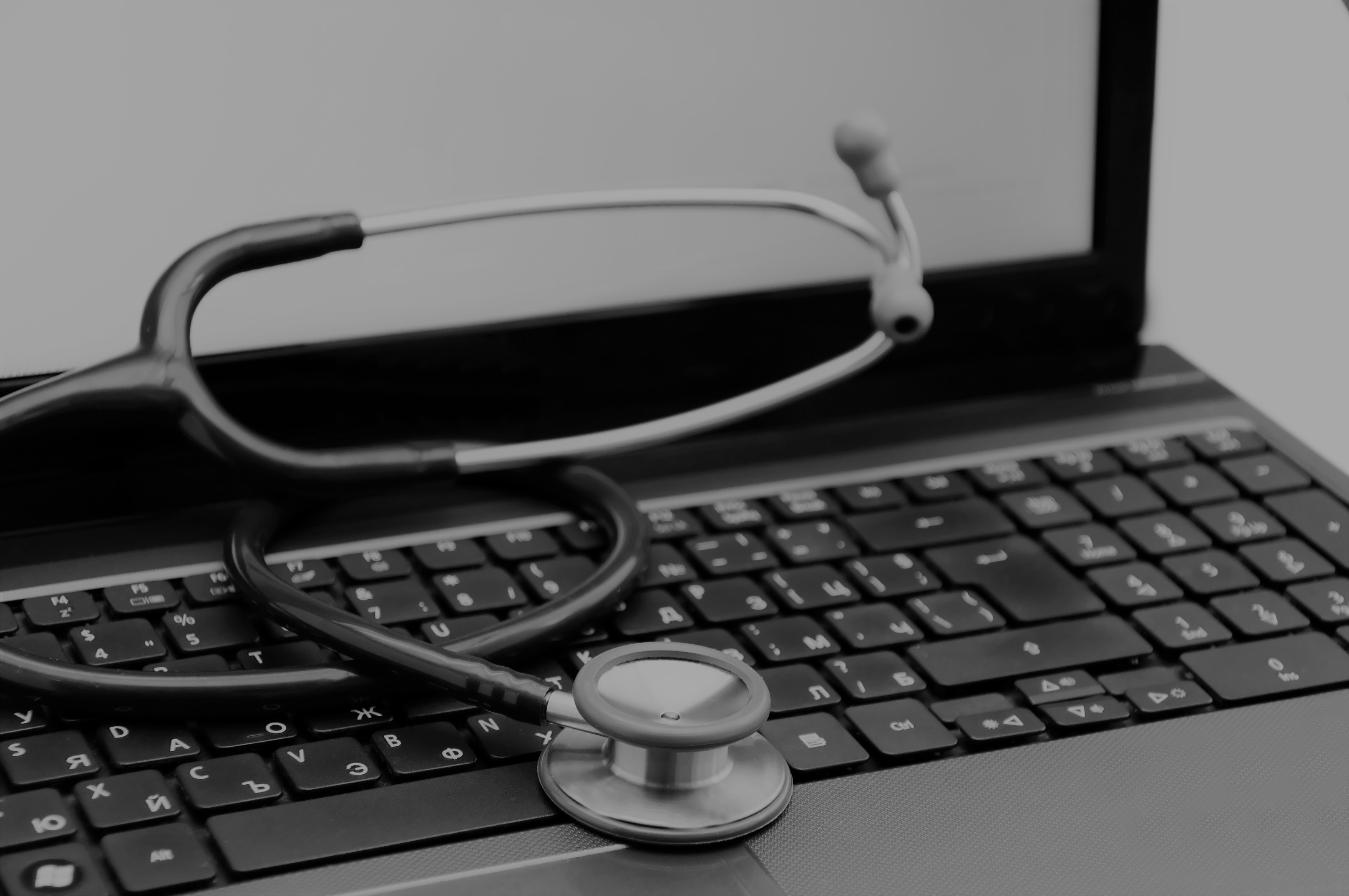 stethoscope on laptop
